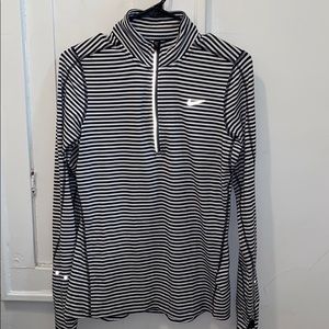 Nike 1/4 zip up. Black and white stripped